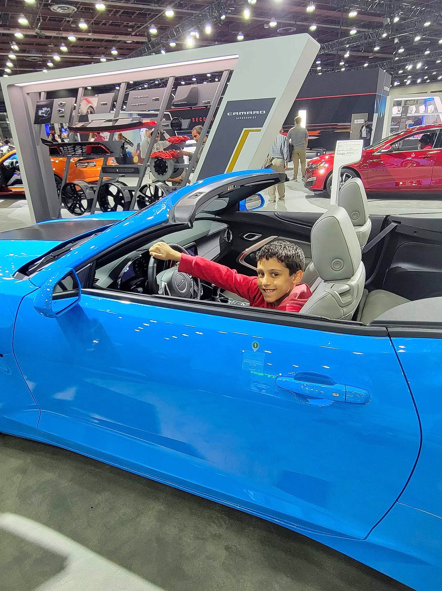 Braydan joined the competition — help win amazing prizes! auto_part, automotive_design, automotive_exterior, automotive_lighting, automotive_tire, automotive_wheel_system, bumper, car, electric_blue, event, hardtop, hood, joy, motor_vehicle, person, personal_luxury_car, rim, roadster, tire, vehicle