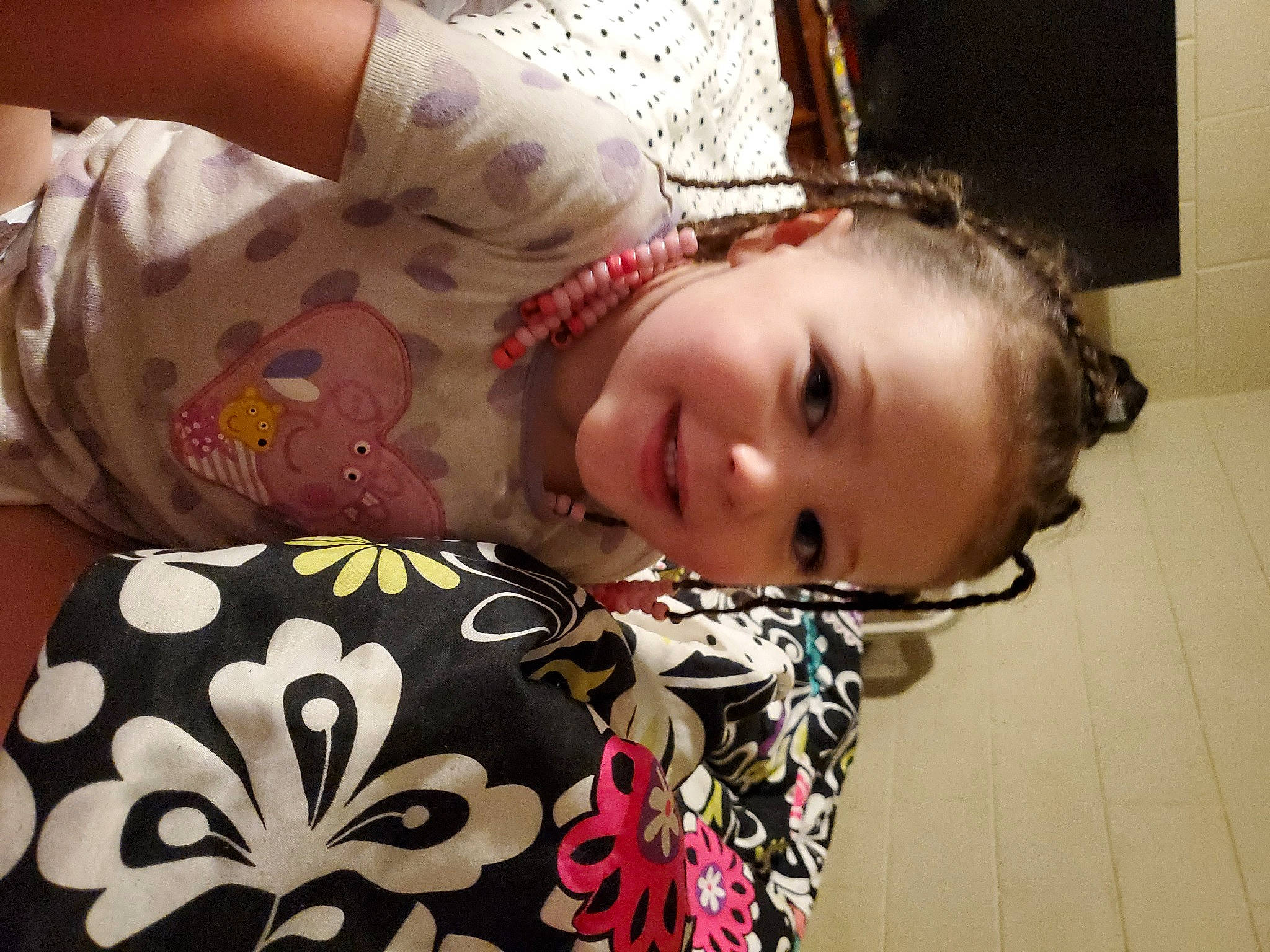 A'Mariyana joined the competition — help win amazing prizes! brown_hair, cheek, child, comfort, dress, eye, eyelash, face, flooring, happy, head, human_body, joy, linens, neck, pattern, person, room, sleeve, smile