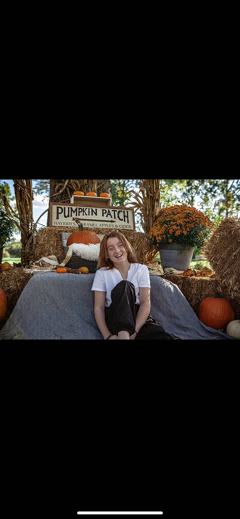 Kylee joined the competition — help win amazing prizes! bench, calabaza, child, flash_photography, font, fun, grass, happy, joy, landscape, leisure, person, plant, pumpkin, rock, sitting, t_shirt, tints_and_shades, travel, vacation