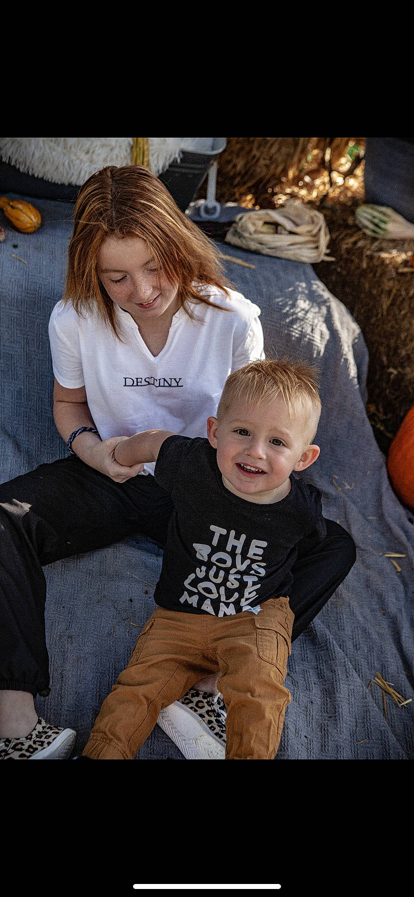 Kylee joined the competition — help win amazing prizes! arm, black, child, flash_photography, fun, grass, hair, happy, human_body, interaction, joy, lap, leg, leisure, muscle, organ, person, smile, sneakers, t_shirt