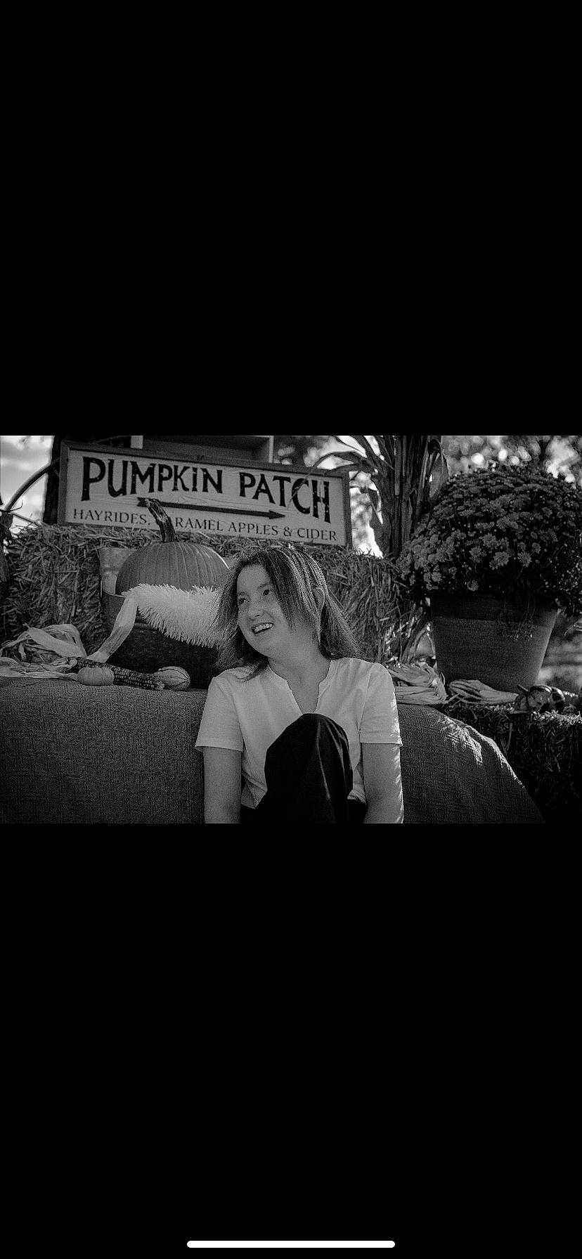 Kylee is registered to the contest to win money with this photo: bedding, black_and_white, comfort, darkness, flash_photography, font, fur, grass, happy, joy, love, monochrome, monochrome_photography, person, photo_caption, plant, room, sitting, still_life_photography, street