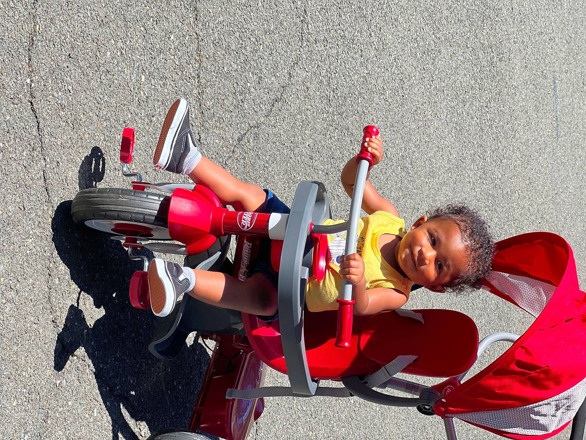 Cairo is registered to the contest to win money with this photo: adventure, boot, carmine, costume, elbow, event, fictional_character, fun, happy, human_leg, joy, knee, leisure, person, personal_protective_equipment, recreation, shoe, shorts, sitting, smile