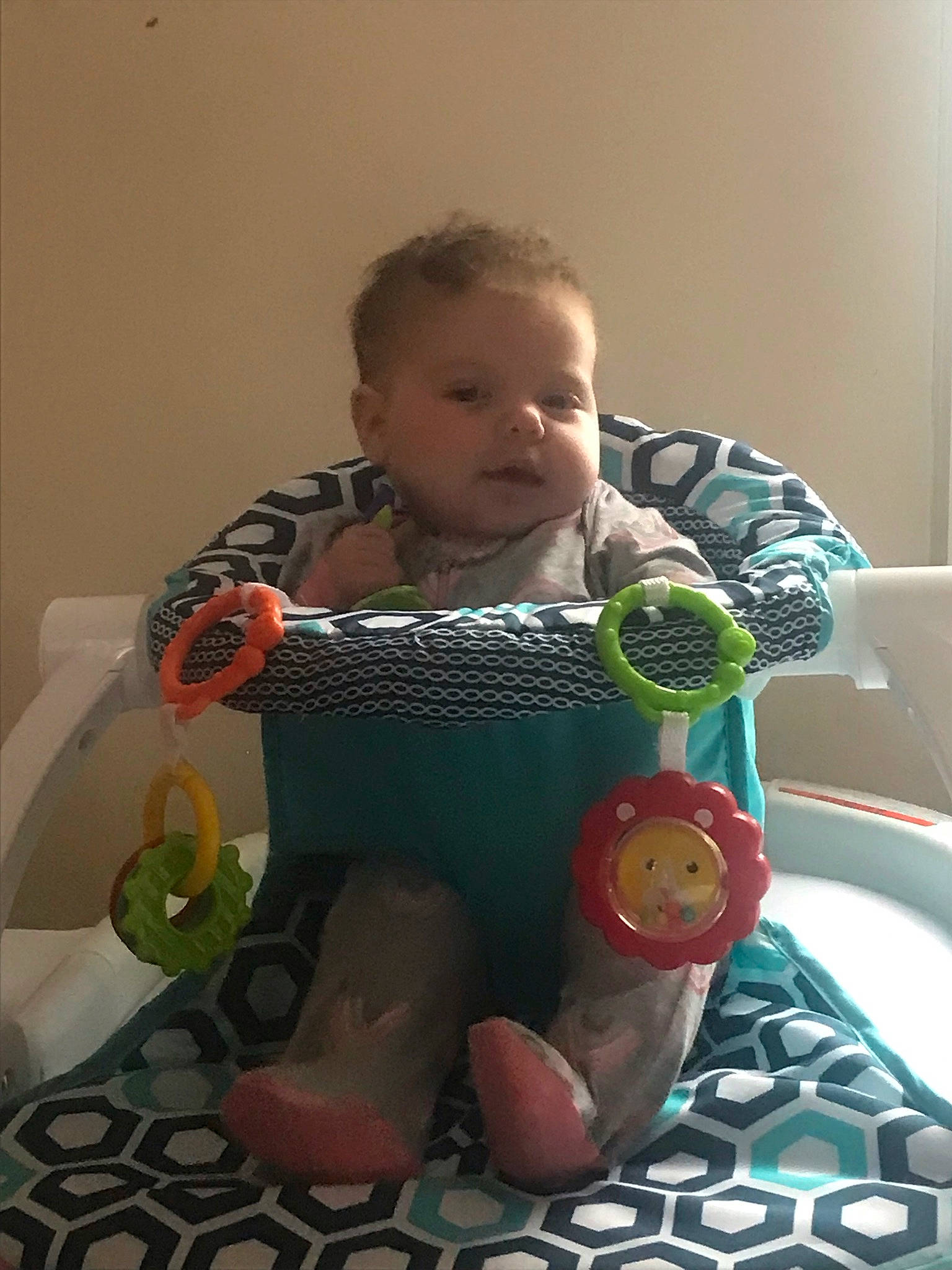 Jupiter is registered to the contest to win money with this photo: baby, baby_products, baby_safety, baby_toddler_clothing, baby_toys, carmine, cheek, child, comfort, flooring, fun, head, person, play, room, sitting, skin, sleeve, thumb, toddler