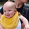 baby, child, smiling, blue_eyes, yellow_bib, outdoor, pool, person, happy, holding, cute, infant, skin, clothing, portrait, face, parent, daylight, casual, joyful