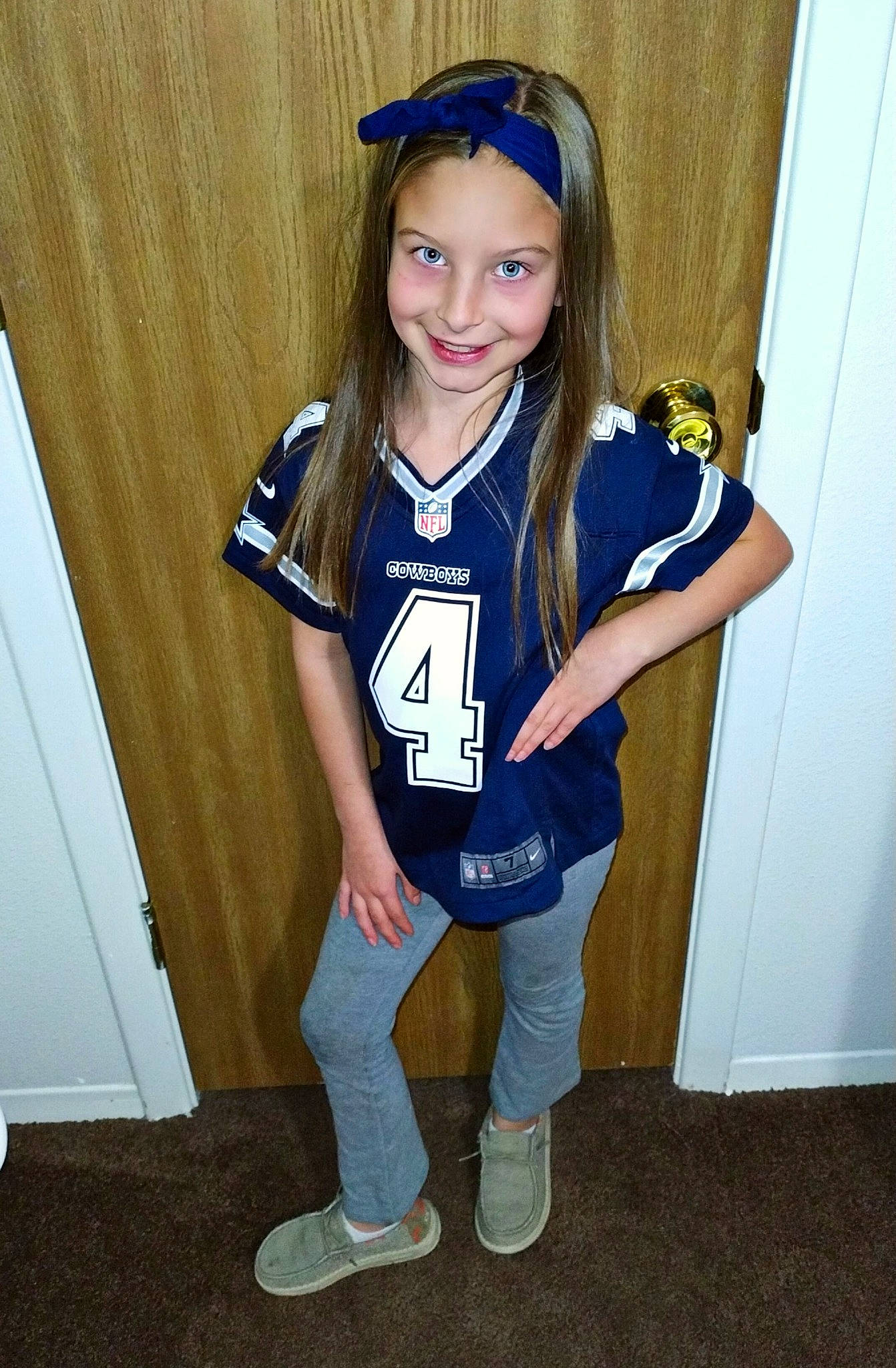 Sarah joined the competition — help win amazing prizes! cheerleading_uniform, electric_blue, eye, face, footwear, gesture, happy, headwear, jersey, joy, knee, leg, person, player, shoe, sleeve, smile, sneakers, sports_uniform, sportswear