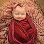 baby, blanket, bow, child, closeup, cozy, cute, headband, infant, newborn, peaceful, pink, portrait, red, resting, sleeping, soft_texture, swaddle, woven_basket, wrapped