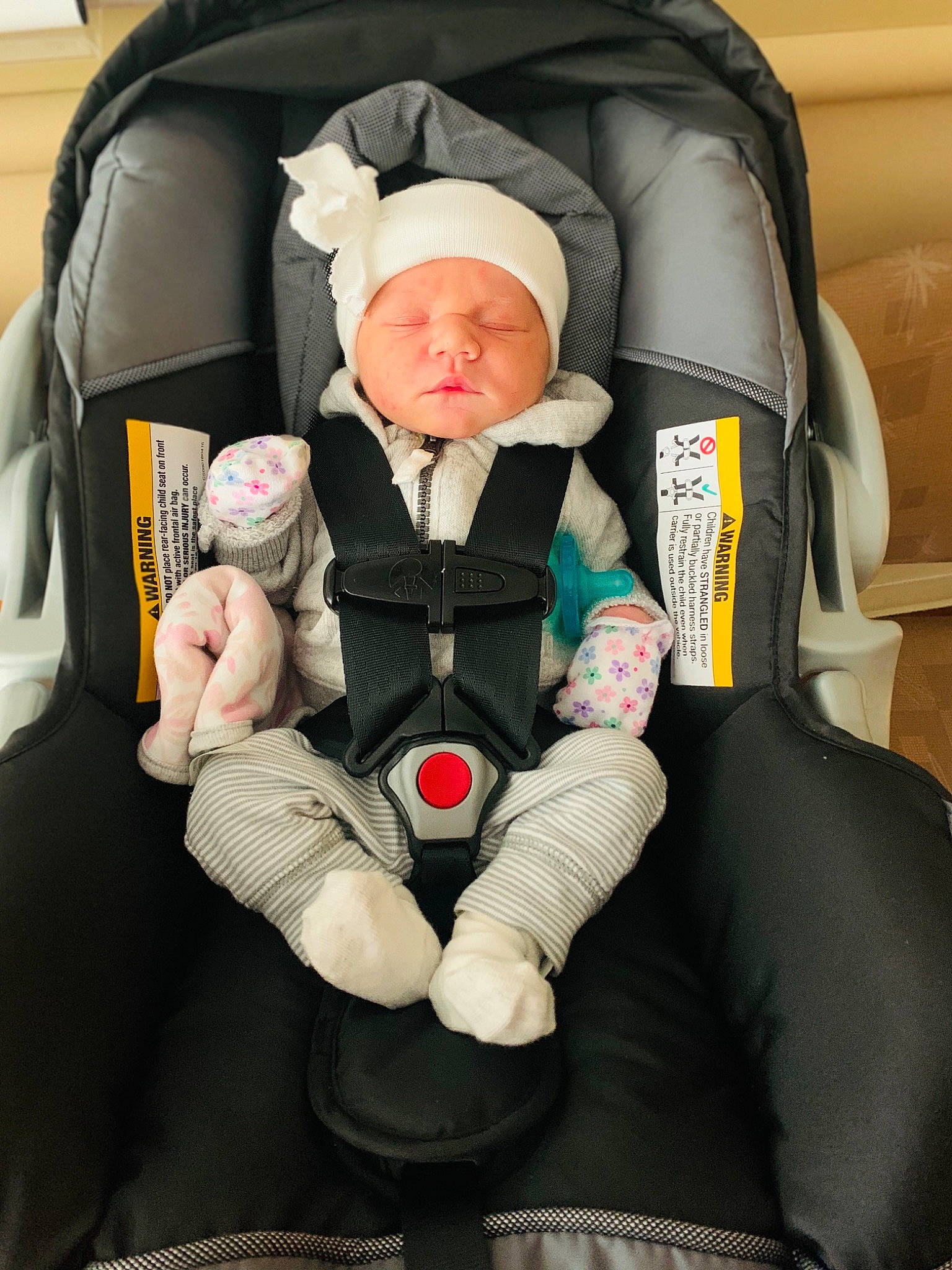 Emeri is registered to the contest to win money with this photo: baby, baby_carriage, baby_carrier, baby_in_car_seat, baby_products, car_seat, car_seat_cover, child, comfort, headwear, person, product, toddler