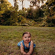 Kaya joined the competition — help win amazing prizes! baby, child, grass, outdoor, nature, sunlight, trees, greenery, smiling, crawling, blue_clothing, happy, infant, summer, cute, portrait, daylight, playful, young_child, sunflare