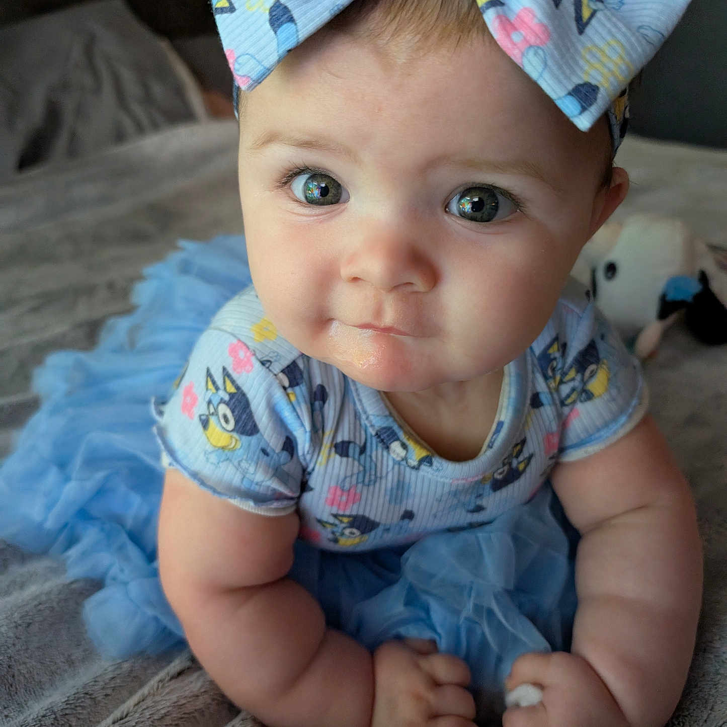 Paisley Grace joined the competition — help win amazing prizes! baby, bodypart, bonnet, cap, clothing, couch, crawling, dress, face, finger, furniture, hand, hat, head, newborn, pants, person, photography, portrait, sitting