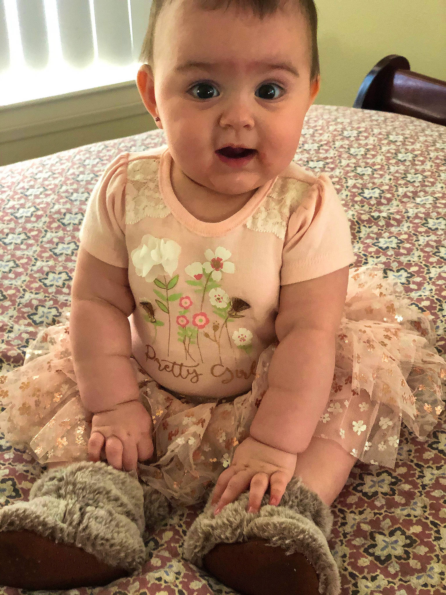 Ellie joined the competition — help win amazing prizes! baby, baby_toddler_clothing, cheek, dress, eye, face, green, hair, hairstyle, hand, head, human_body, iris, leg, lip, mouth, nose, person, photograph, skin