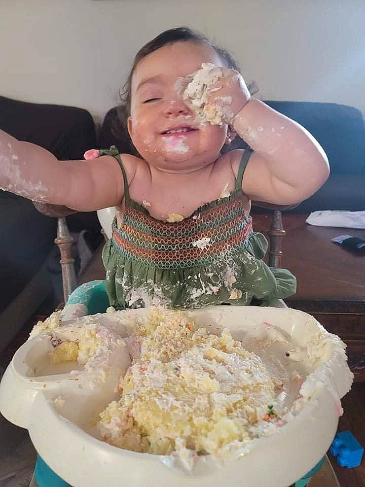 Ellie joined the competition — help win amazing prizes! baby, chair, child, comfort_food, cooking, cuisine, dessert, dish, event, food, fun, happy, icing, ingredient, jewellery, meal, person, recipe, smile, sweetness