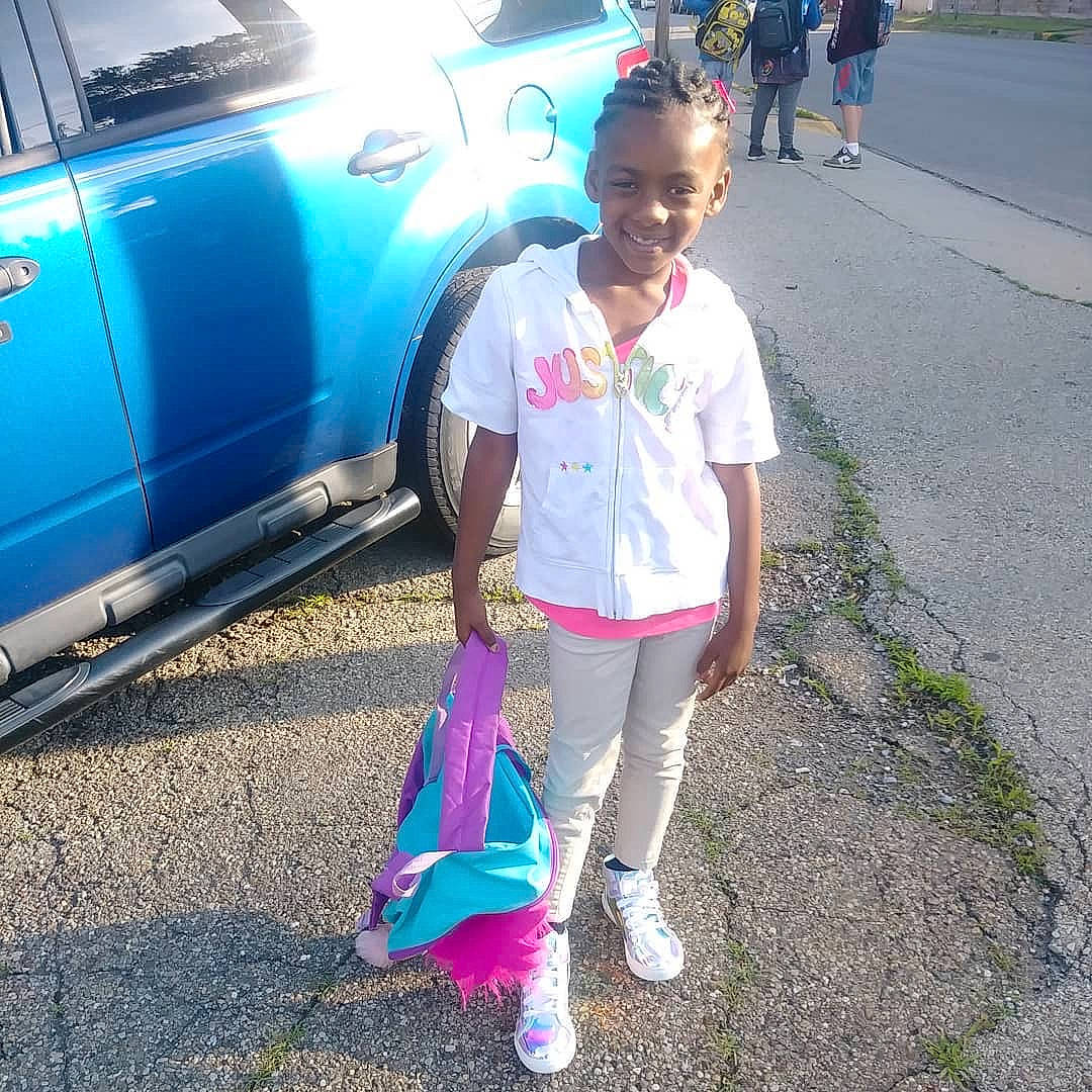 Jada joined the competition — help win amazing prizes! asphalt, car, child, city_car, family_car, joy, luxury_vehicle, mountain, person, plant, vacation, vehicle, walking