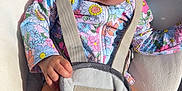 Hennessey joined the competition — help win amazing prizes! baby, child, colorful, comfort, cushion, cute, expression, floral_clothing, hand, infant, legs, outdoor, portrait, resting, seat, skin, straps, summer, sunhat, sunlight