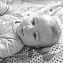 Raphaël a rejoint le concours — aidez-le/la à gagner de superbes lots ! baby, infant, face, eyes, blanket, pattern, clothing, sleepwear, cute, lying_down, portrait, monochrome, black_and_white, newborn, soft, expression, skin, head, child, young