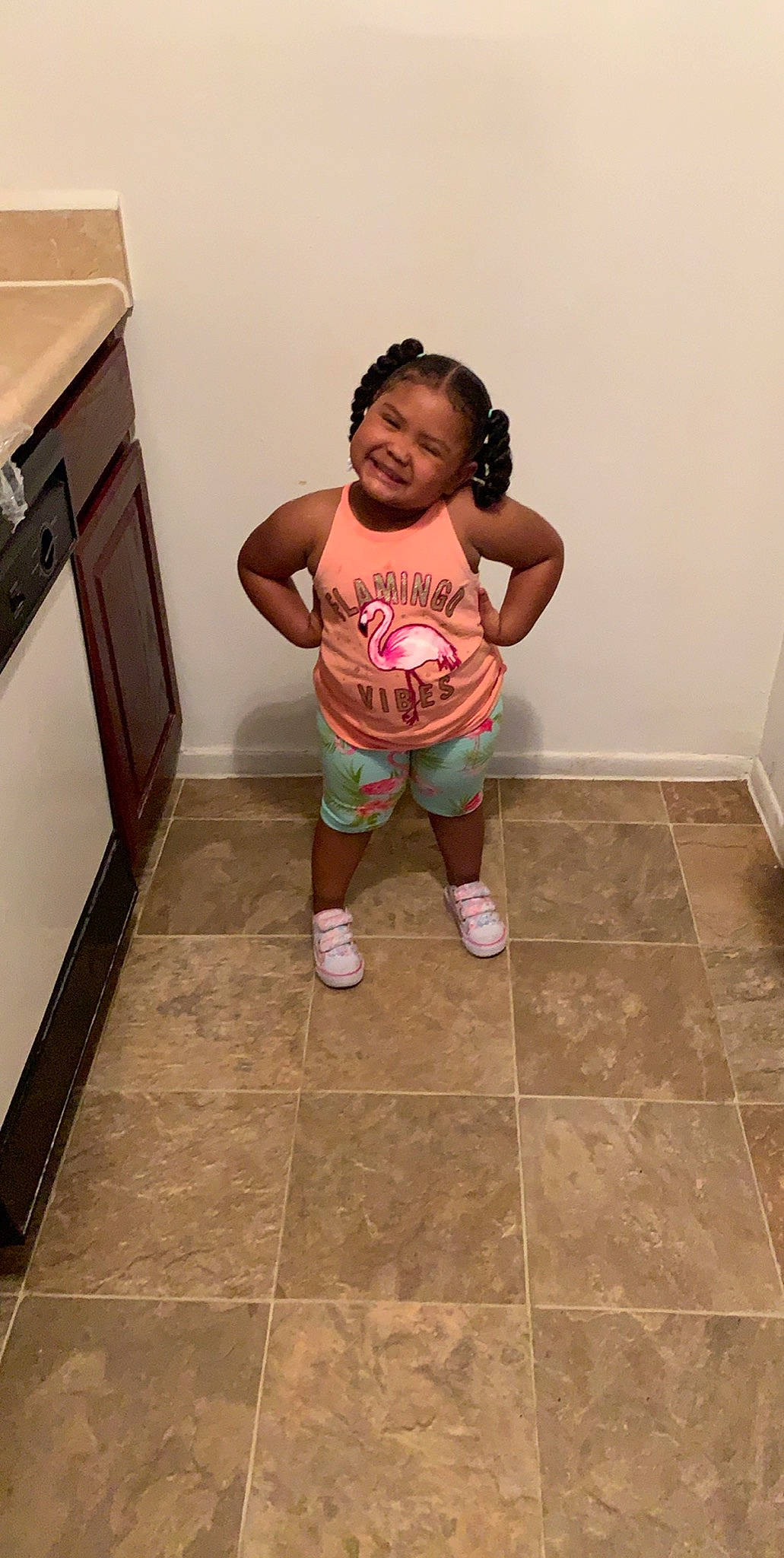 Kaleigh is registered to the contest to win money with this photo: child, floor, flooring, joy, person, room, tile, toddler