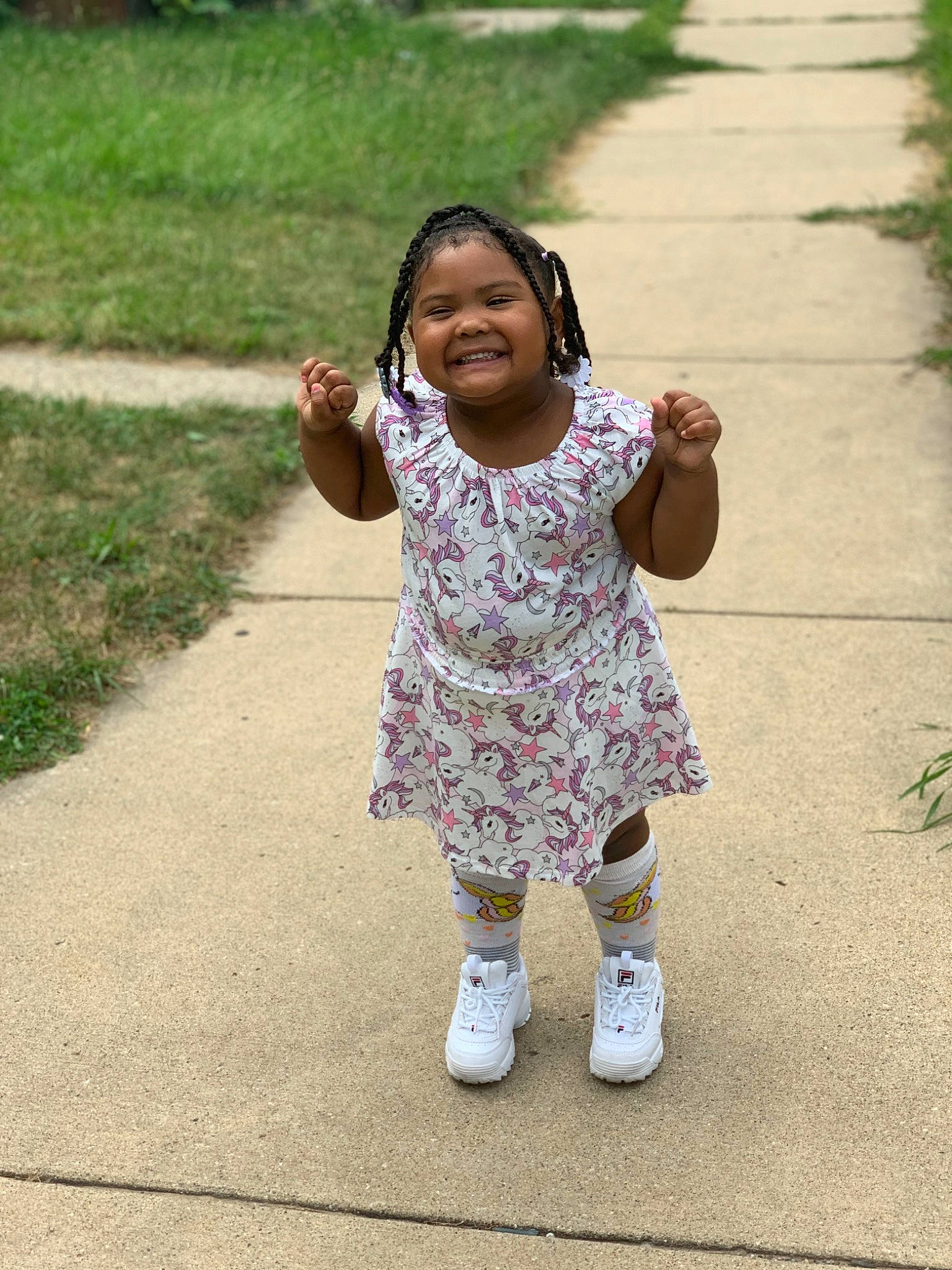 Kaleigh joined the competition — help win amazing prizes! adaptation, baby, child, facial_expression, fun, gesture, grass, happy, joy, person, plant, play, recreation, shoe, skin, smile, toddler, walking