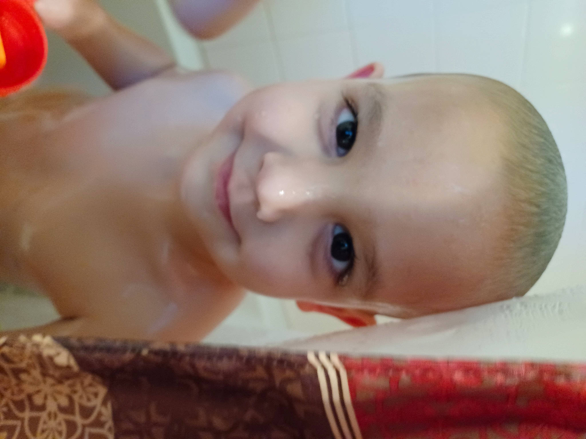 Everett is registered to the contest to win money with this photo: bathing, cheek, chest, child, chin, dress, ear, eye, eyebrow, eyelash, happy, iris, jaw, joy, lip, mouth, neck, nose, person, skin