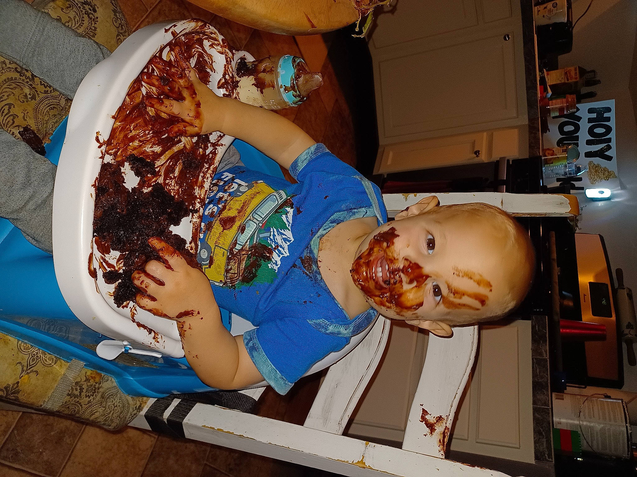 Levi is registered to the contest to win money with this photo: abdomen, baby, chest, child, comfort_food, cooking, elbow, fast_food, food, fun, hairstyle, homemaker, ingredient, leisure, machine, pastry, person, room, thigh