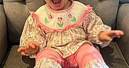 Ivy joined the competition — help win amazing prizes! armchair, baby, bow, child, comfortable, cute, feet, floral_pattern, girl, gray_furniture, happy, headband, indoors, laughing, pink_clothing, portrait, sitting, smiling, sock, toddler