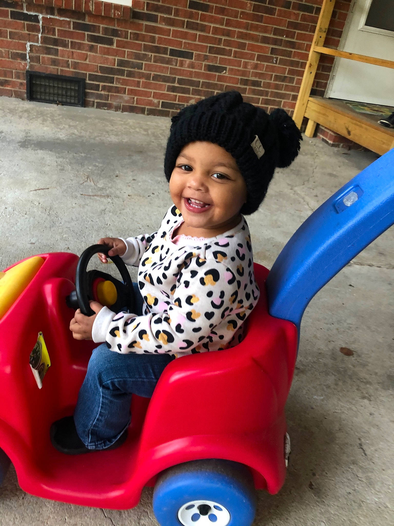 Leilani is registered to the contest to win money with this photo: baby_products, baby_toys, child, fun, joy, outdoor_play_equipment, person, play, playground, product, public_space, riding_toy, toddler, toy, vehicle