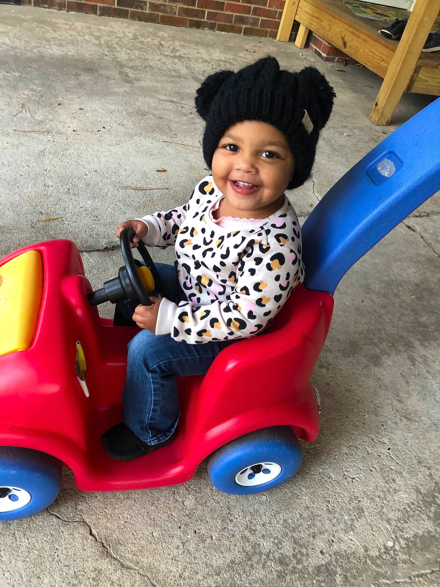 Leilani joined the competition — help win amazing prizes! baby_products, car, child, fun, joy, person, play, playground, product, public_space, riding_toy, smile, toddler, toy, tricycle, vehicle