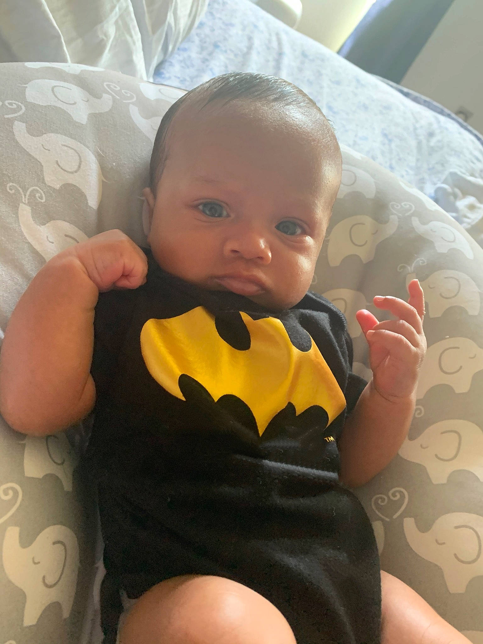 Tempo is registered to the contest to win money with this photo: baby, cheek, child, ear, electronic_device, eye, face, finger, hand, head, leg, mouth, neck, nose, person, product, sitting, skin, thumb, toddler