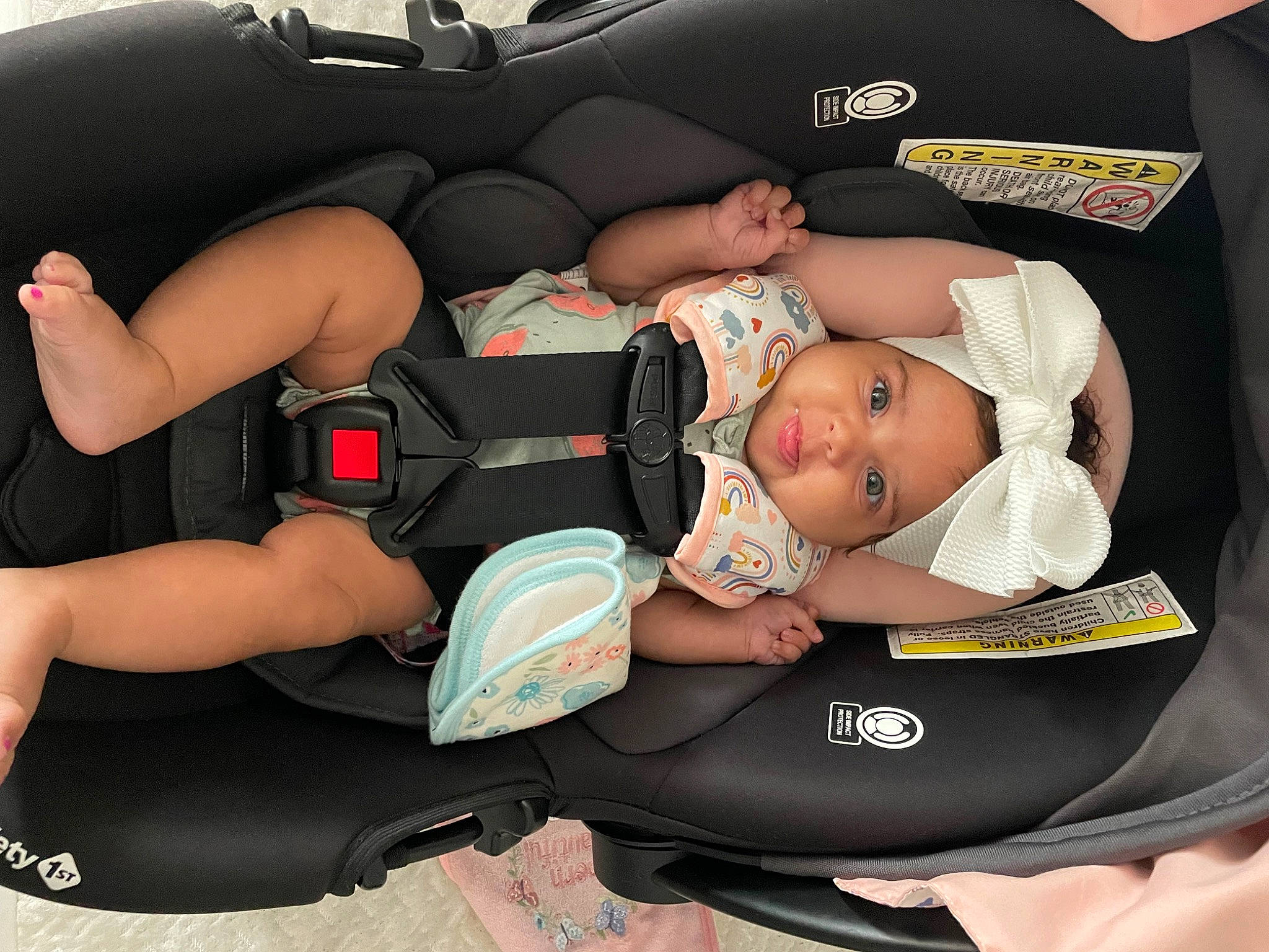 Londyn joined the competition — help win amazing prizes! abdomen, baby, baby_carriage, baby_products, baby_sleeping, baby_toddler_clothing, car_seat, chest, child, comfort, elbow, finger, headwear, human_body, human_leg, knee, lap, person, sitting, thigh