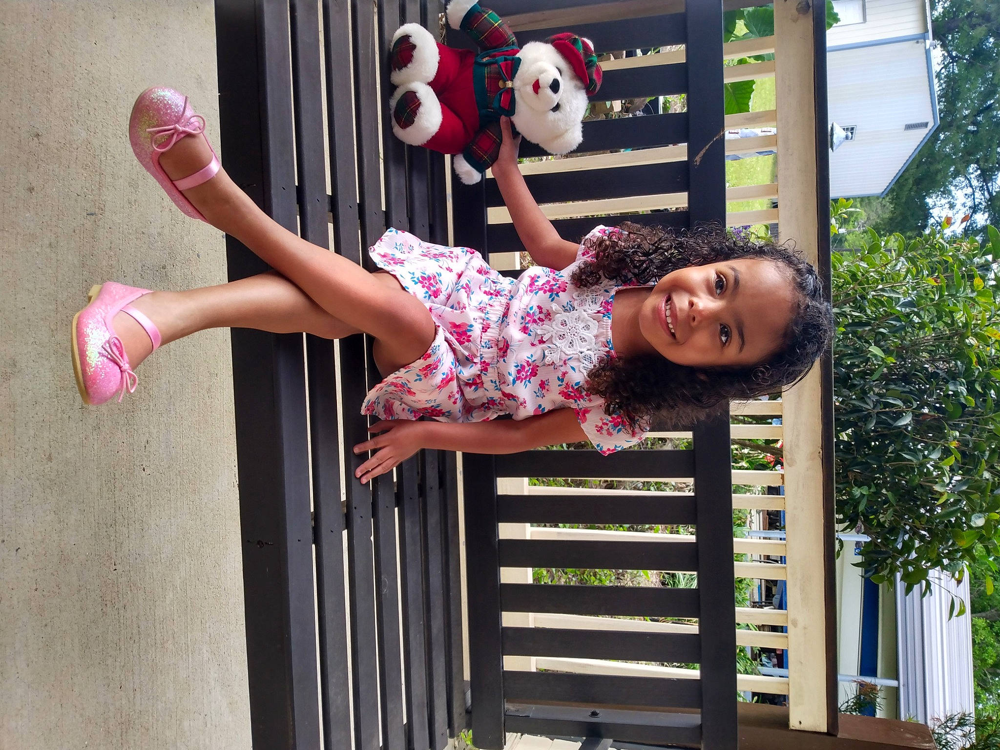 Karisma is registered to the contest to win money with this photo: beauty, child, dress, facial_expression, fun, grass, happy, human_body, joy, leisure, magenta, people, person, pink, shorts, smile, snapshot, summer, thigh, toddler