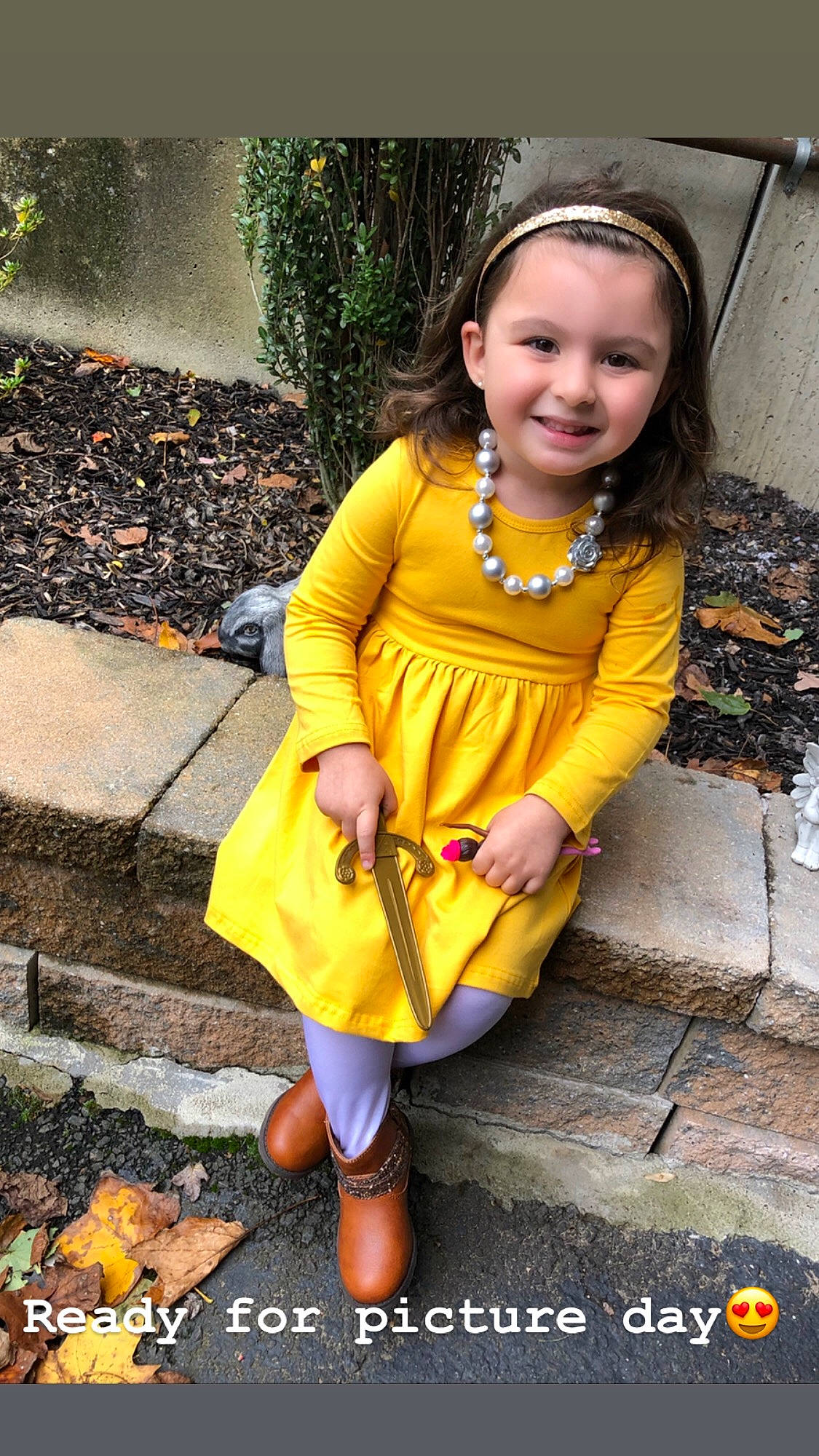 Giuliana is registered to the contest to win money with this photo: candy_corn, child, child_model, fashion_accessory, happy, headwear, joy, orange, person, plant, smile, yellow