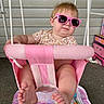 Athena joined the competition — help win amazing prizes! baby, child, sunglasses, pink, swing, outdoor, portrait, seated, smiling, playful, infant, floral_shirt, feet, barefoot, playground, backyard, siding, toy, colorful, fashionable