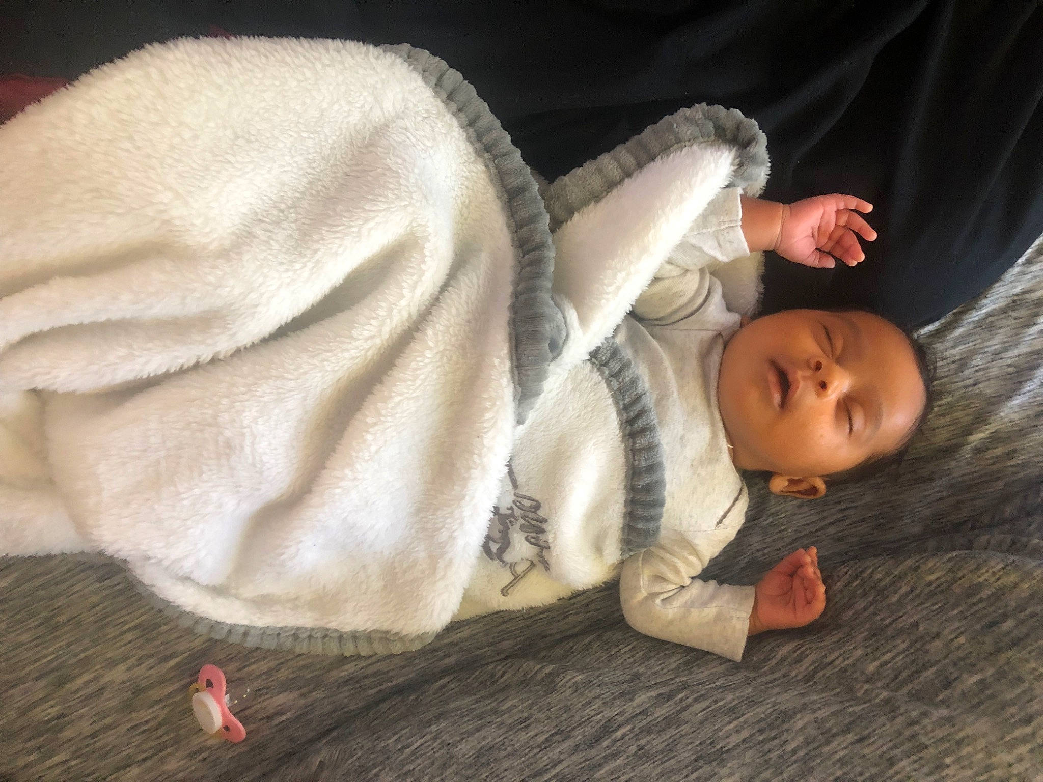 Lynette joined the competition — help win amazing prizes! baby, baby_sleeping, baby_toddler_clothing, bedtime, carmine, child, comfort, finger, flash_photography, flooring, fur, hardwood, human_body, linens, person, sitting, skin, textile, toddler, wood