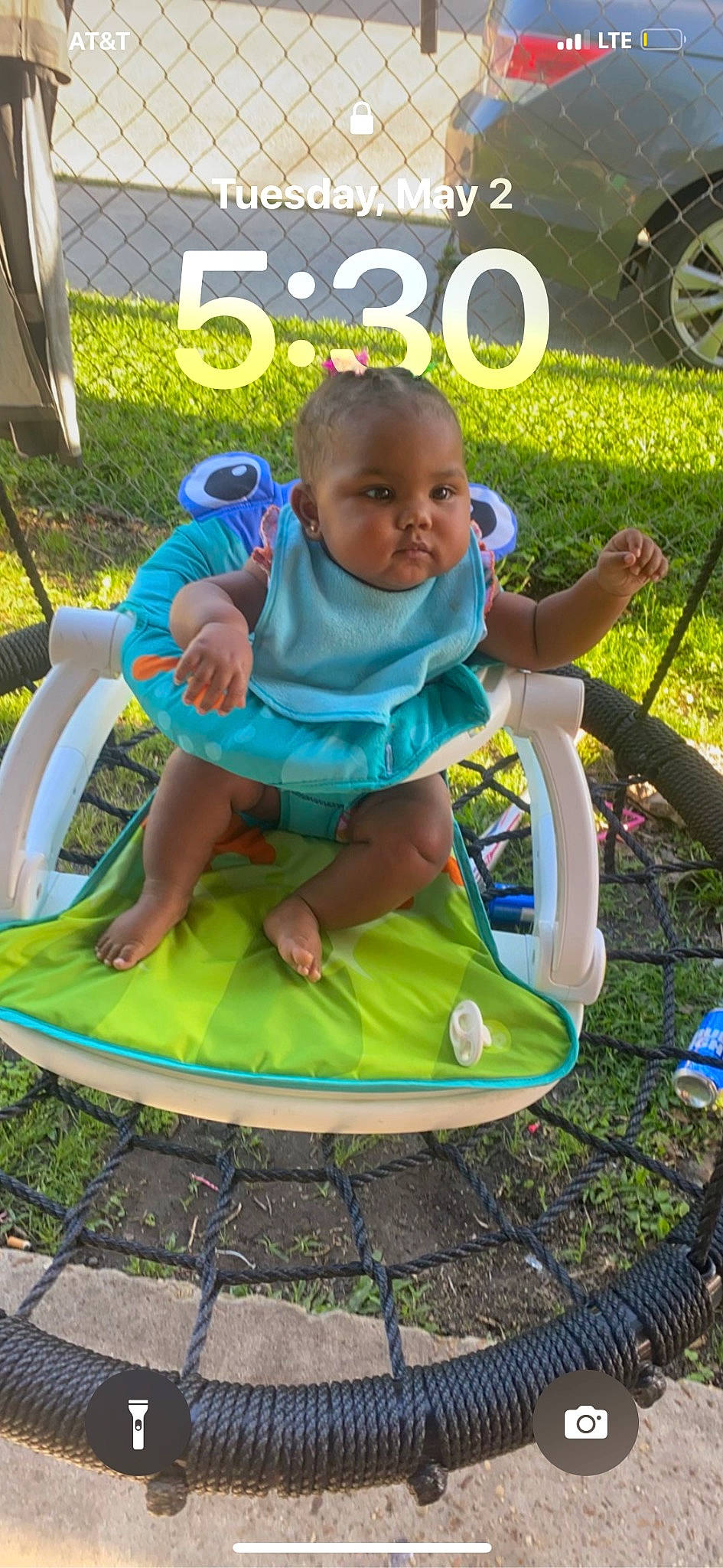 Layla is registered to the contest to win money with this photo: baby, baby_products, baby_safety, baby_toddler_clothing, bicycle_tire, chair, child, electric_blue, fun, grass, green, leisure, outdoor_play_equipment, person, plant, play, recreation, summer, tire, toddler