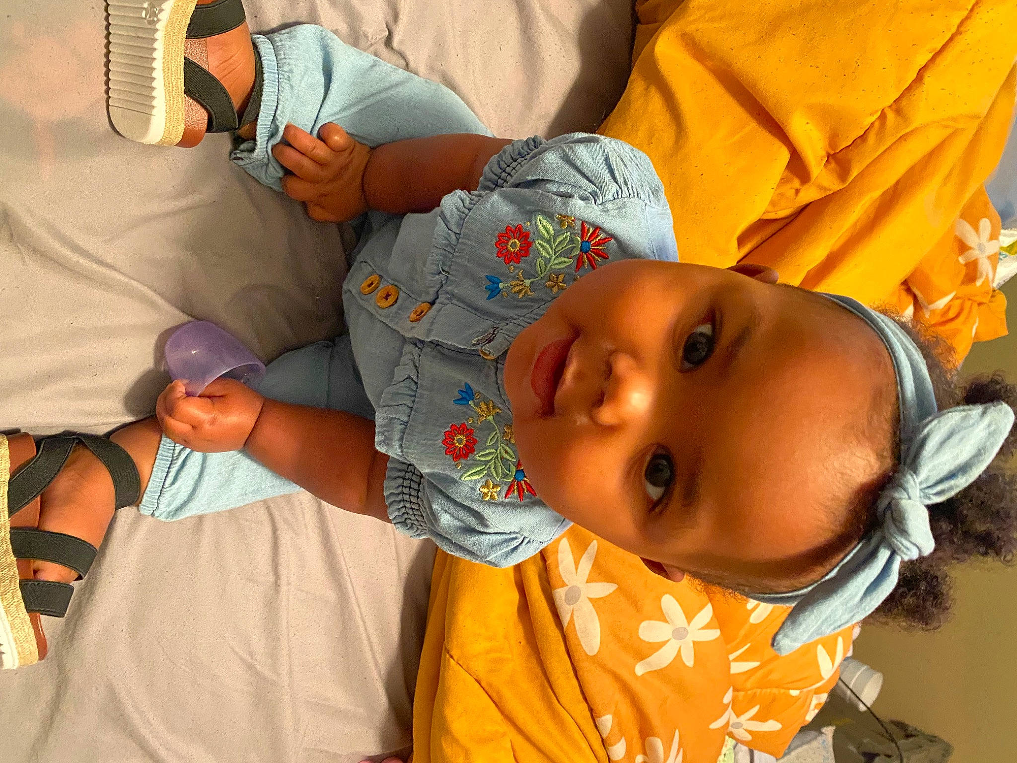 Layla joined the competition — help win amazing prizes! adaptation, baby, baby_products, baby_toddler_clothing, cheek, child, clothing, comfort, elbow, fun, happy, headgear, human_body, mouth, nose, orange, organ, person, room, skin