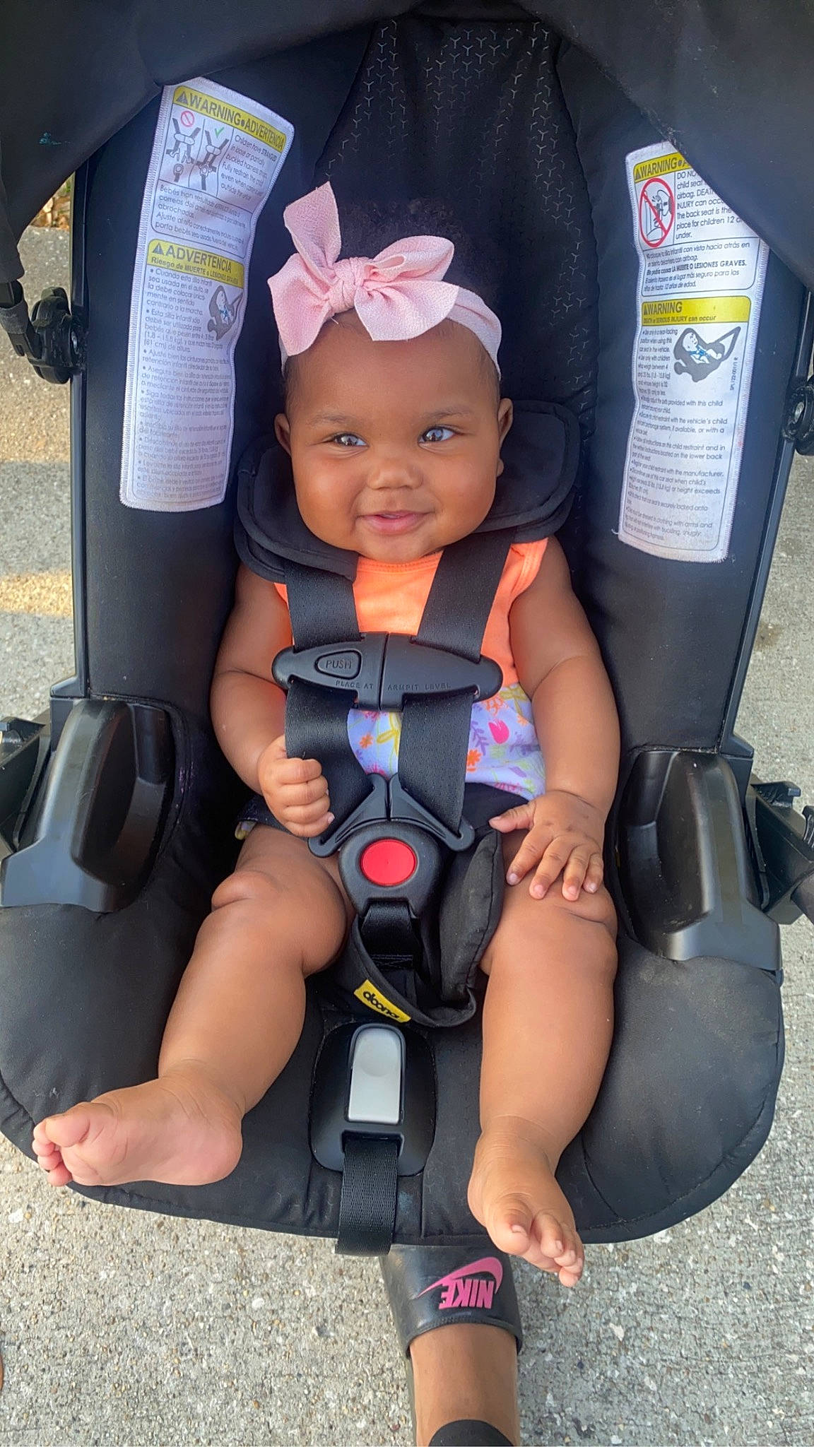 Layla joined the competition — help win amazing prizes! auto_part, baby, baby_carriage, baby_products, bag, car_seat, child, comfort, electric_blue, fashion_accessory, headwear, joy, knee, luggage_and_bags, person, product, seat_belt, service, sitting, smile