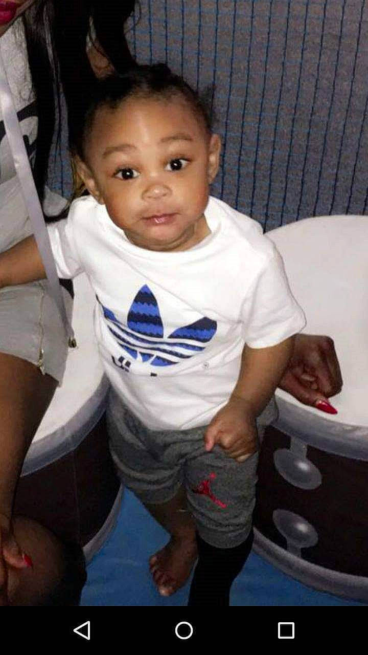 Keyaan is registered to the contest to win money with this photo: baby_toddler_clothing, black_hair, cheek, chest, cool, elbow, eye, flash_photography, fun, hairstyle, happy, joint, mouth, person, shorts, shoulder, skin, sleeve, t_shirt, thigh