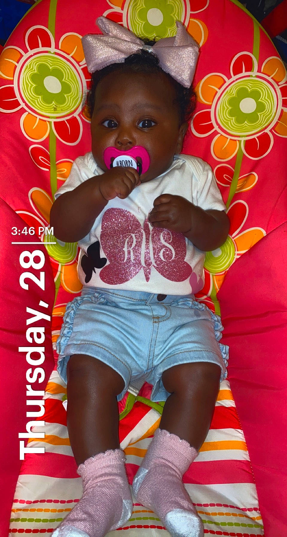 Raven is registered to the contest to win money with this photo: baby, baby_toddler_clothing, cap, child, fruit, fun, green, happy, human_leg, magenta, organ, pattern, person, pink, plant, red, shorts, skin, t_shirt, thigh