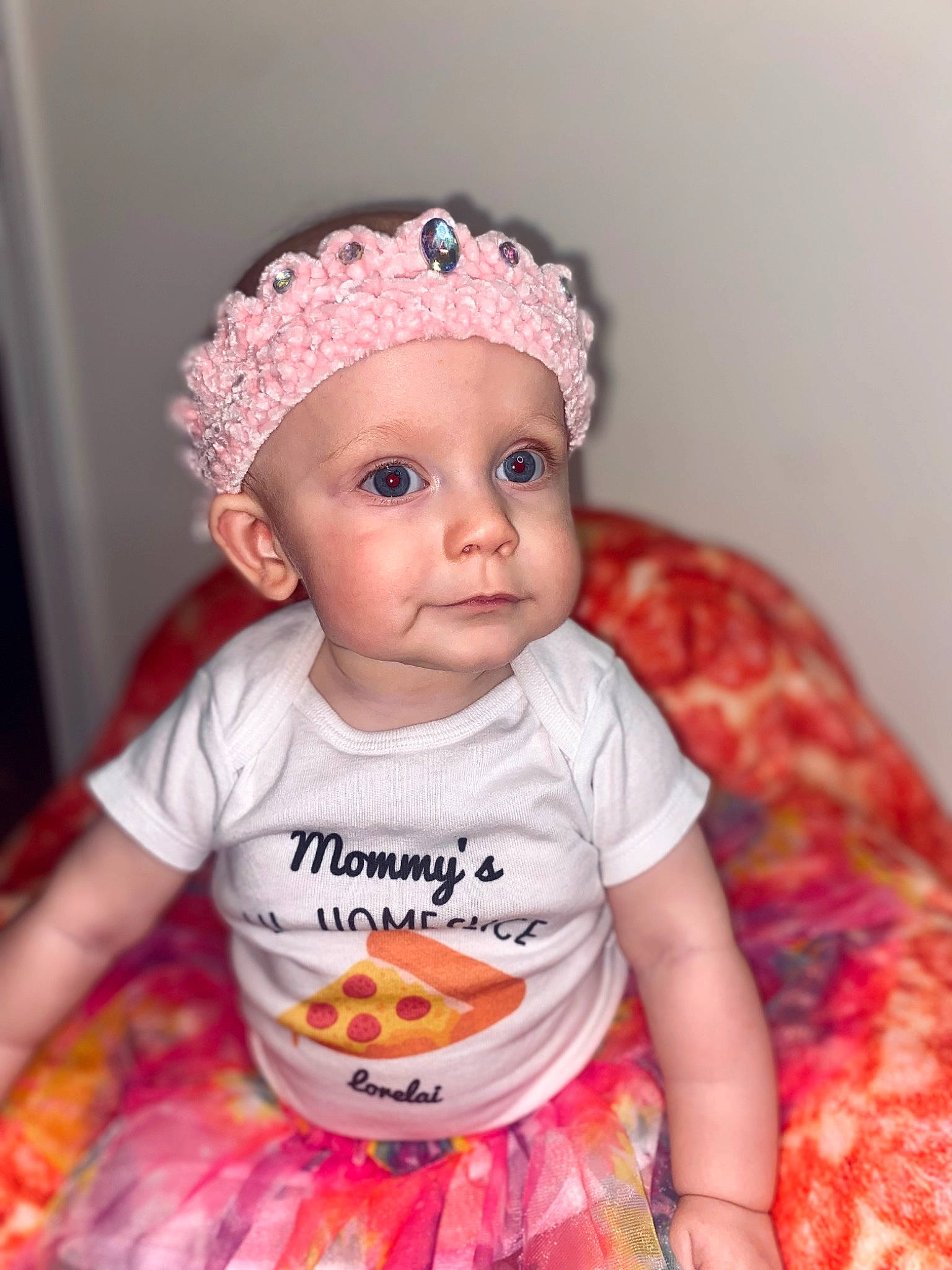 Lorelai is registered to the contest to win money with this photo: baby, baby_toddler_clothing, cap, cheek, child, costume_hat, fashion_accessory, happy, hat, headgear, headwear, iris, lip, magenta, pattern, person, pink, skin, sleeve, t_shirt