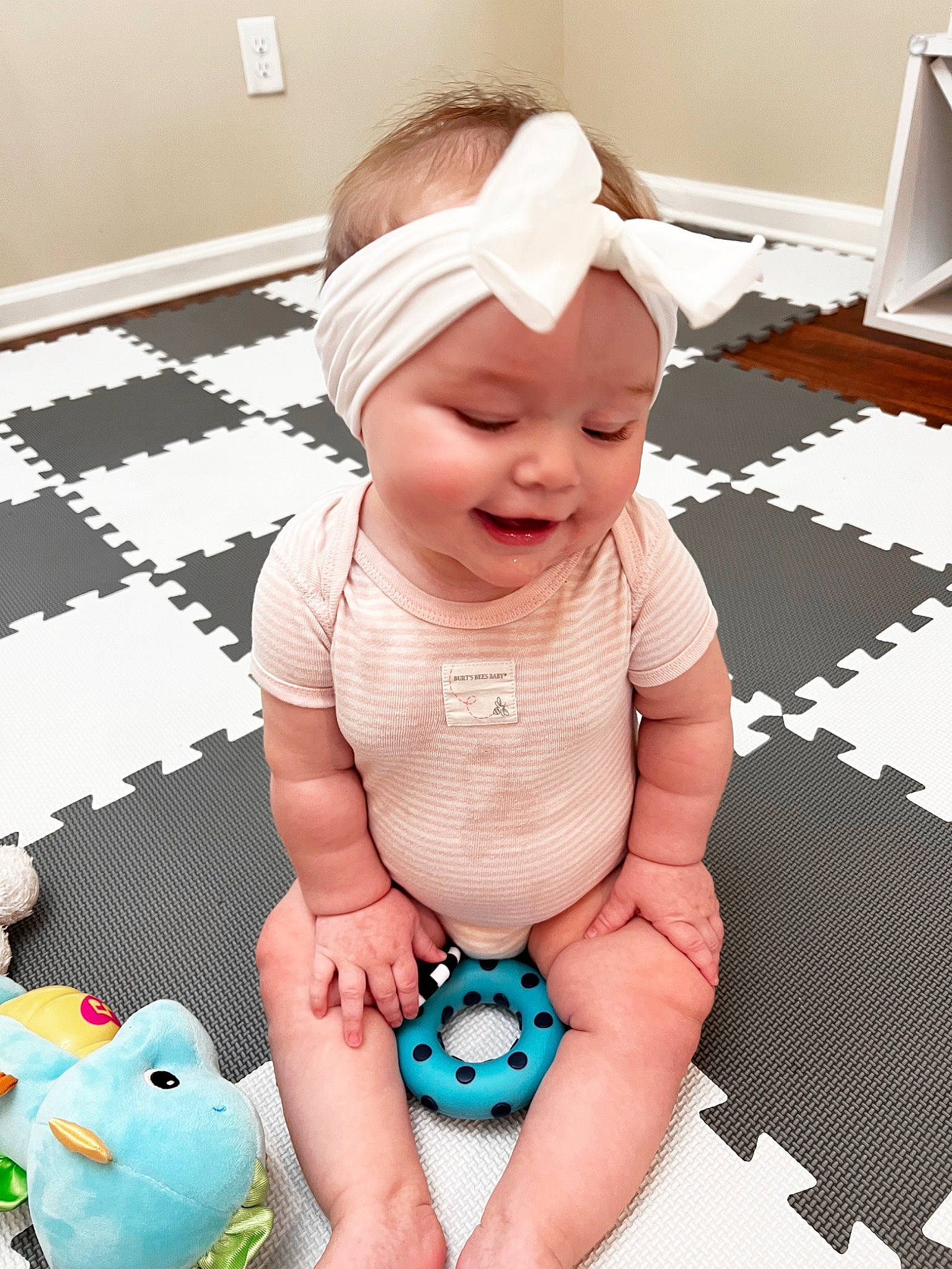 Clara joined the competition — help win amazing prizes! baby, baby_toddler_clothing, cheek, child, finger, floor, green, hand, happy, head, headwear, mouth, person, photograph, pink, product, purple, skin, smile, textile