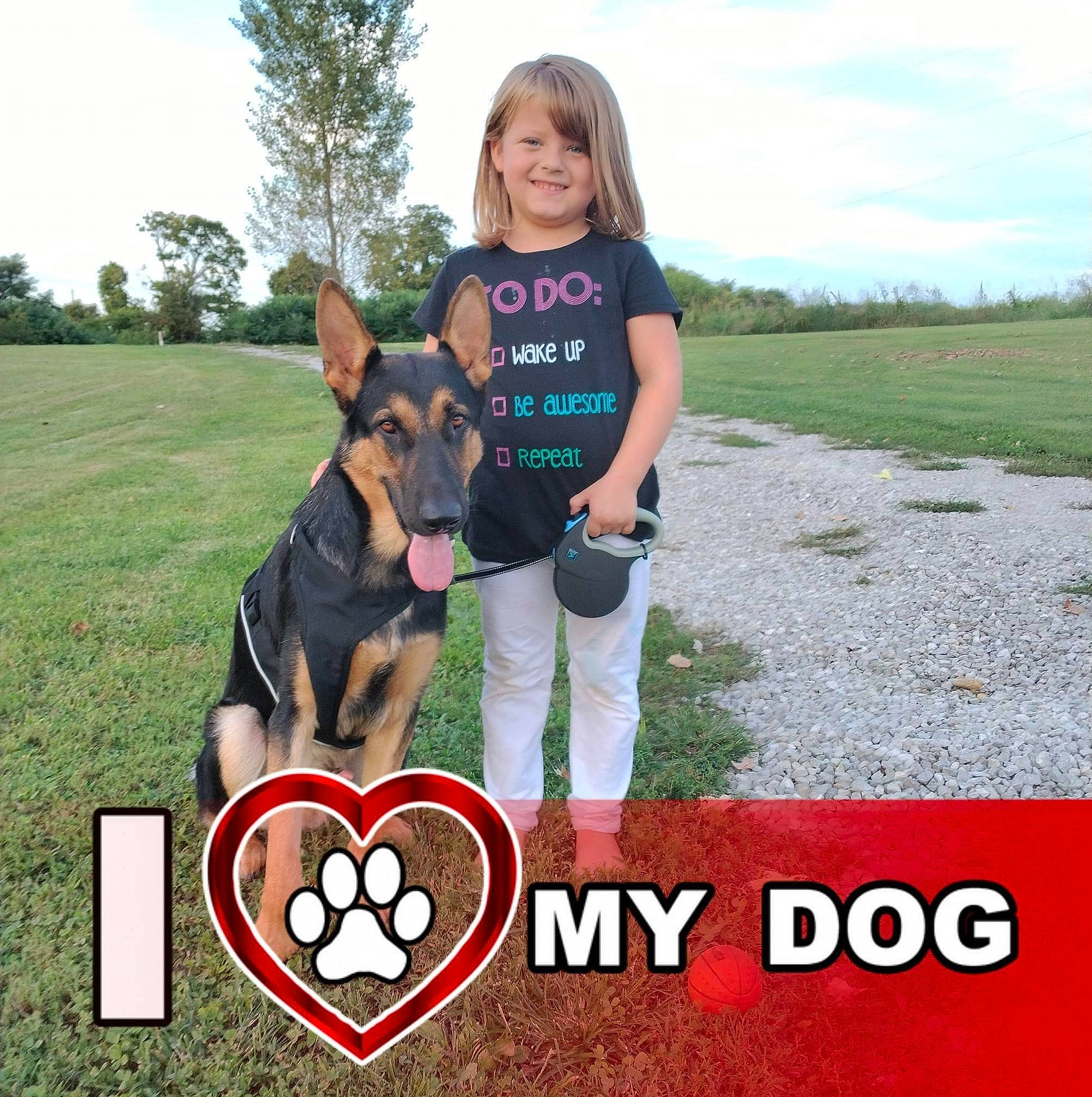 Gabrielle is registered to the contest to win money with this photo: advertising, carnivore, cloud, companion_dog, dog, dog_breed, font, fun, grass, grassland, happy, joy, leisure, people_in_nature, person, photo_caption, recreation, sky, smile, t_shirt