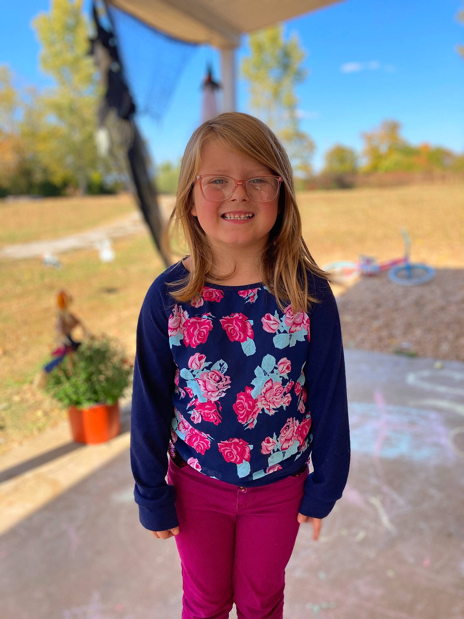 Gabrielle joined the competition — help win amazing prizes! electric_blue, eyewear, flowerpot, happy, houseplant, joy, landscape, leisure, long_hair, magenta, pattern, person, plant, shoulder, sleeve, standing, t_shirt, travel, tree, trunk