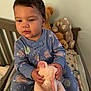 Kieza joined the competition — help win amazing prizes! animal, baby, bed, bodypart, cat, couch, crib, face, finger, furniture, hand, head, indoors, infantbed, nursery, person, pet, photography, portrait, toy