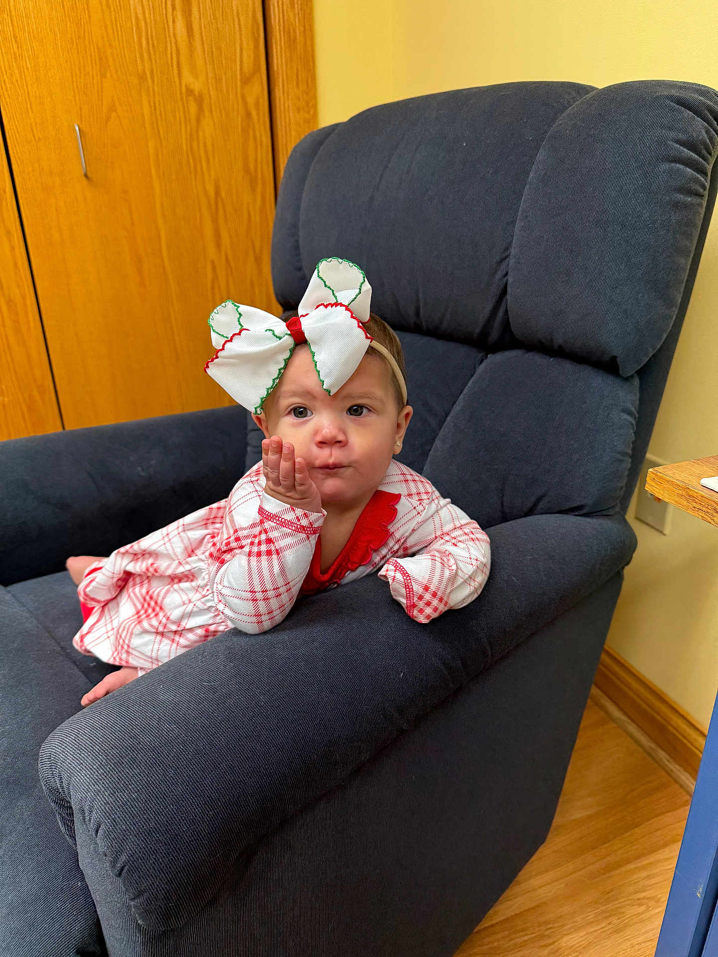 Kieza joined the competition — help win amazing prizes! architecture, armchair, baby, bonnet, building, chair, clothing, couch, face, furniture, hardwood, hat, head, indoors, livingroom, person, recliner, room, sitting, wood