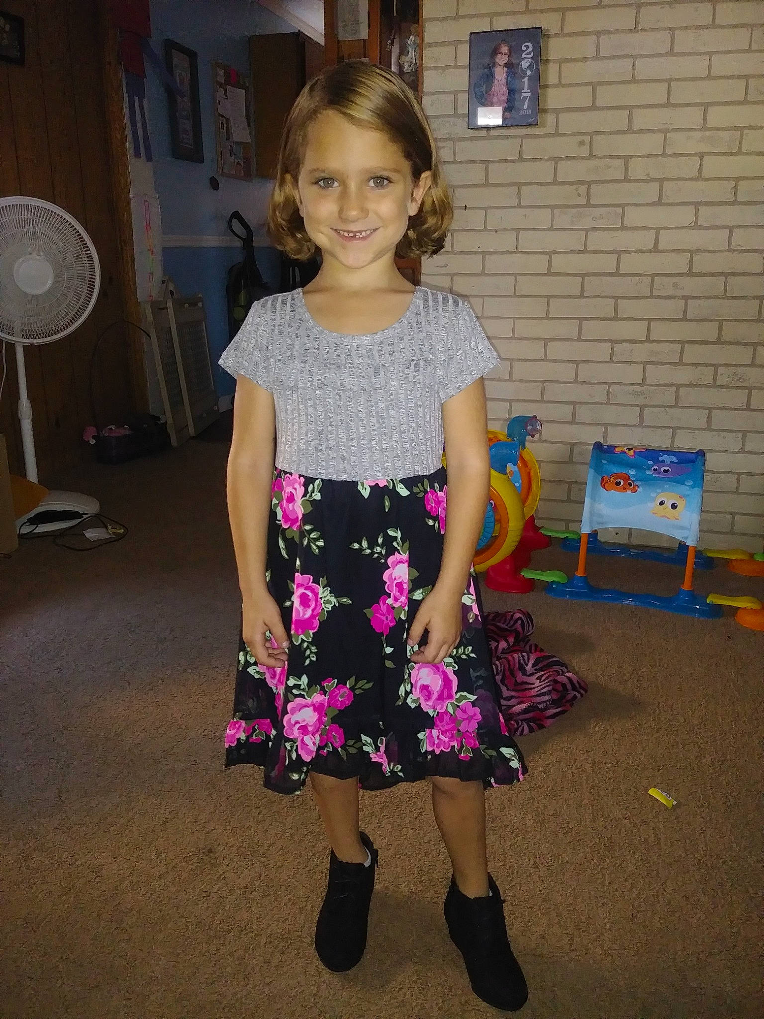 Skylar joined the competition — help win amazing prizes! carpet, child, clothing, cocktail_dress, day, dress, fashion, fashion_design, flooring, footwear, fun, girl, joy, pattern, person, pink, product, shoulder, smile, standing