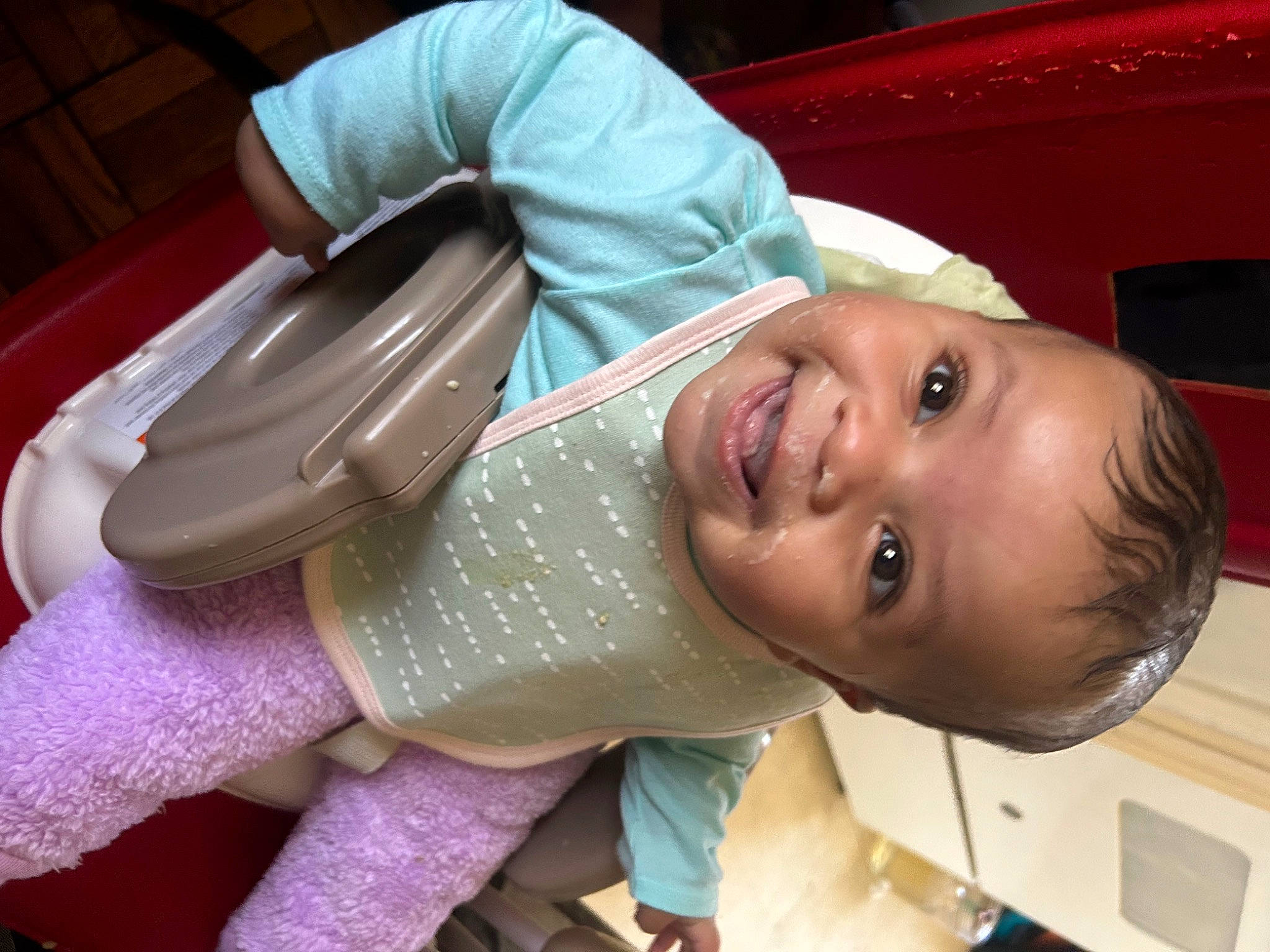 Isabella is registered to the contest to win money with this photo: baby, baby_products, baby_toddler_clothing, cheek, chest, child, comfort, facial_expression, fun, happy, hat, linens, mouth, nose, person, room, skin, sleeve, smile, toddler