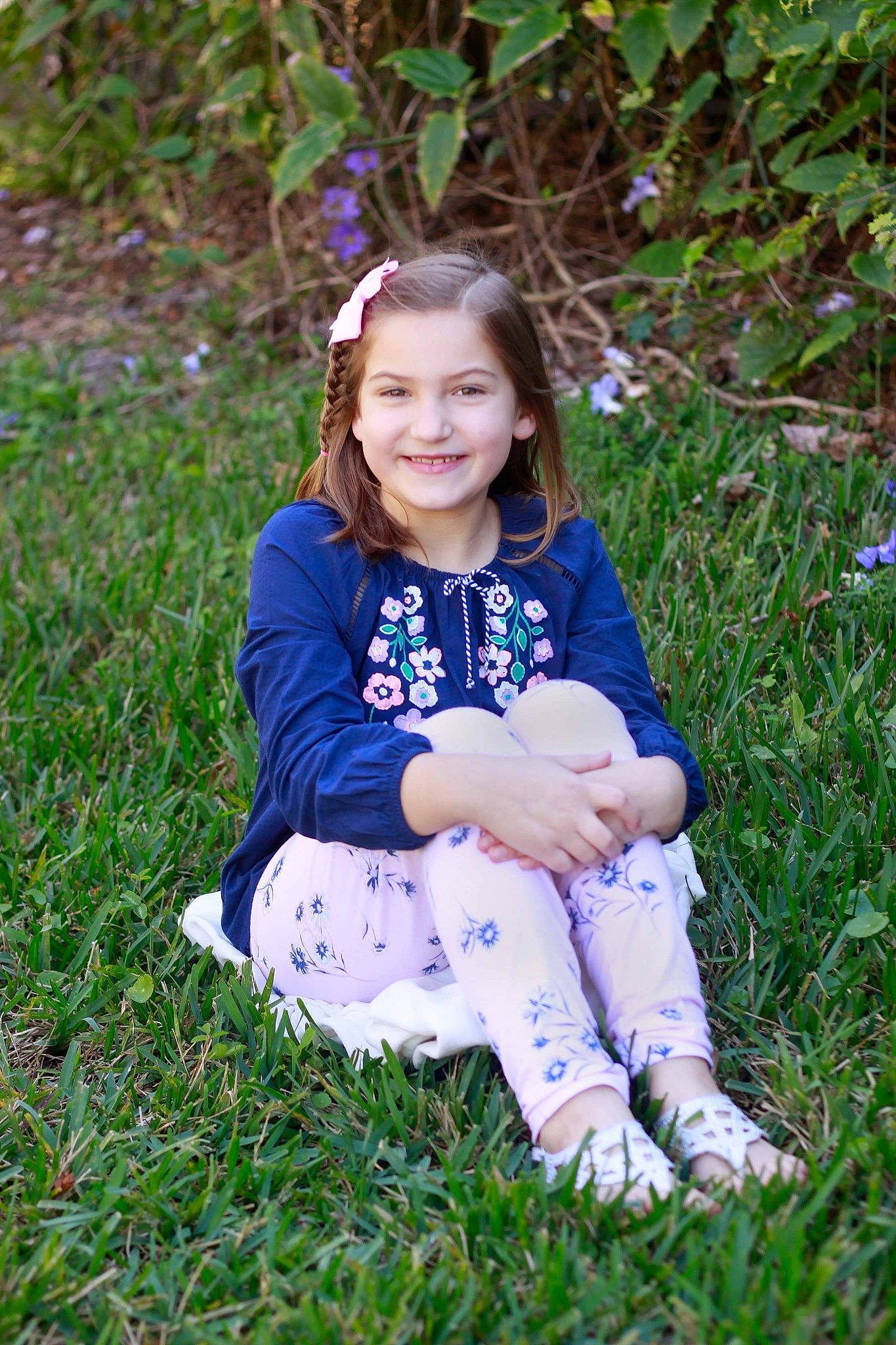 Peyton is registered to the contest to win money with this photo: botany, child, family, fawn, flower, grass, grass_family, green, happy, joy, leaf, meadow, people, people_in_nature, person, photography, plant, sitting, smile, spring