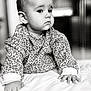 Camille a rejoint le concours — aidez-le/la à gagner de superbes lots ! baby, black_and_white, candid, child, clothing, cute, expression, face, floral, hand, indoors, infant, lying_down, pattern, person, portrait, skin, sleeve, soft_focus, young