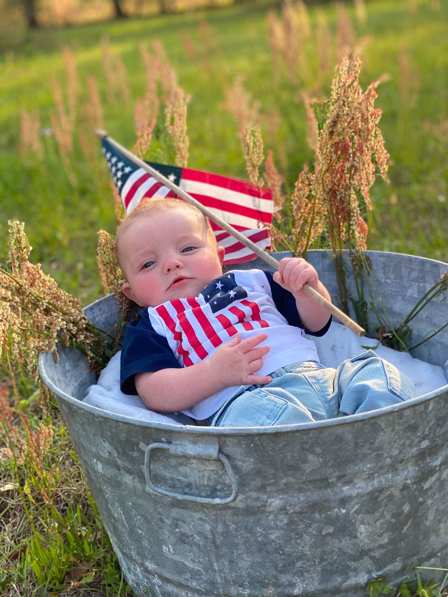 Braylen joined the competition — help win amazing prizes! baby, baby_products, flag, fun, grass, grass_family, grassland, happy, lawn, leaf, leisure, meadow, people_in_nature, person, photograph, plant, product, recreation, sitting, toddler