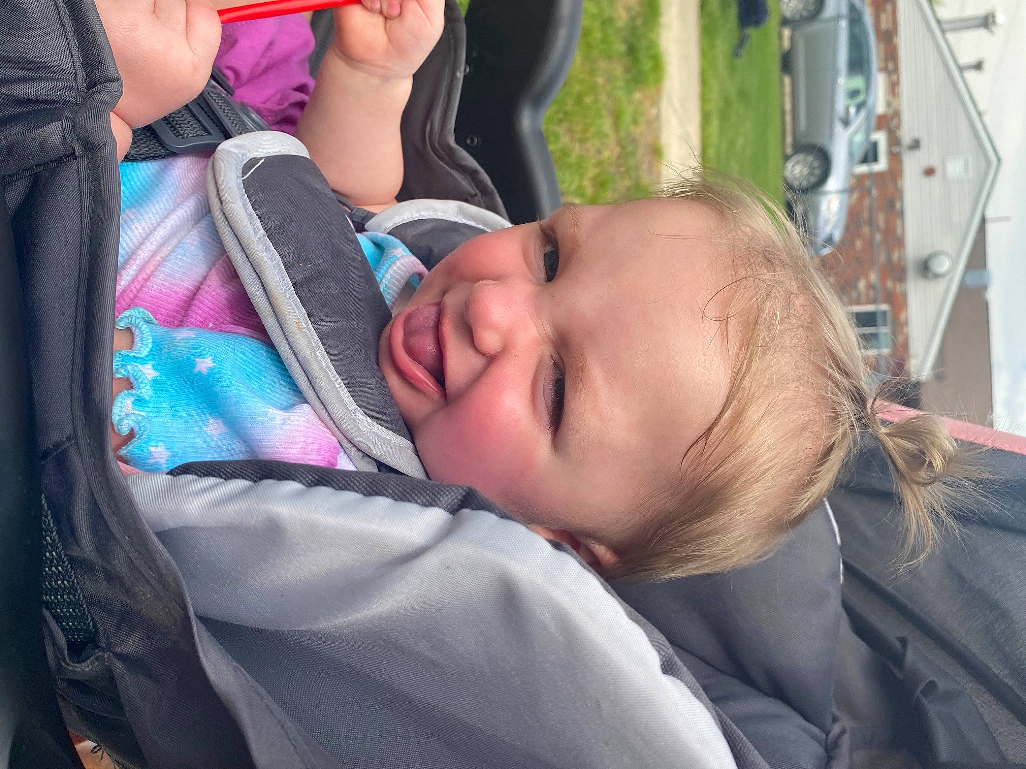 Rhaenyra is registered to the contest to win money with this photo: baby, baby_carriage, baby_products, baby_toddler_clothing, car_seat, cheek, child, comfort, eyelash, fun, grass, happy, leisure, people, person, plant, recreation, smile, tire, toddler