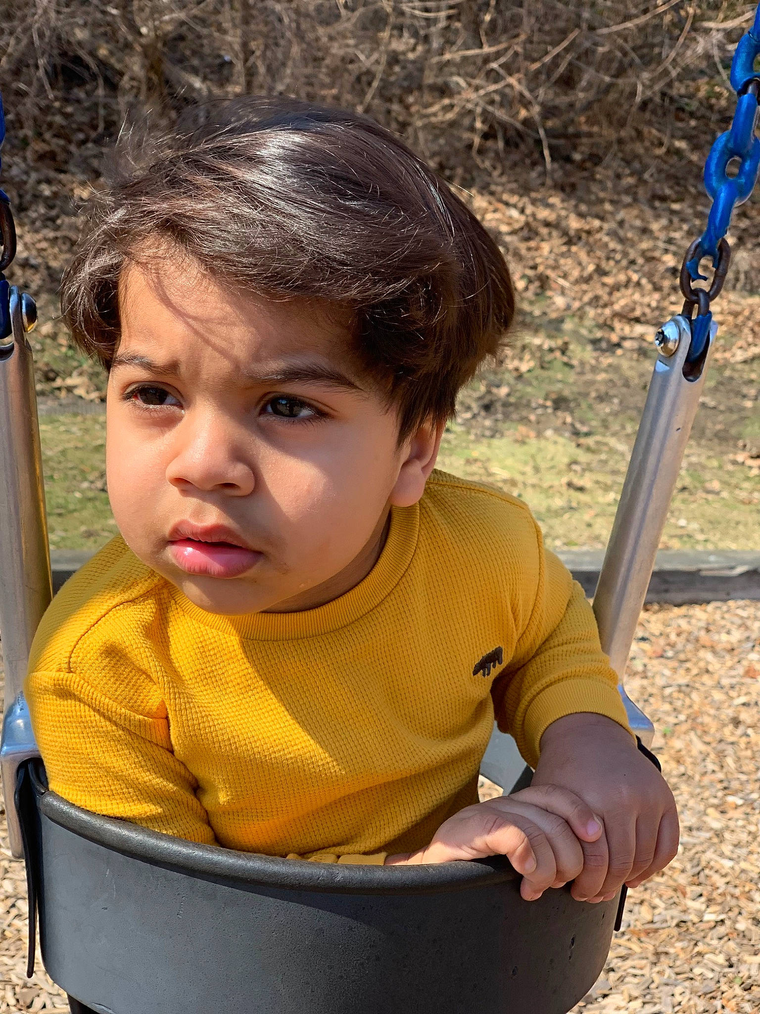 Gustavo is registered to the contest to win money with this photo: adaptation, baby, black, blue, cheek, child, eye, fun, grass, happy, leisure, nose, organ, people, person, photograph, recreation, sitting, skin, toddler