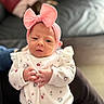 Emy participe au concours pour gagner de l'argent avec cette photo : adorable, baby, child, clothing, cute, cute_prints, eyes, face, hands, headband, holding, indoor, infant, newborn, newborn_baby, person, pink_bow, portrait, soft_light, white_outfit